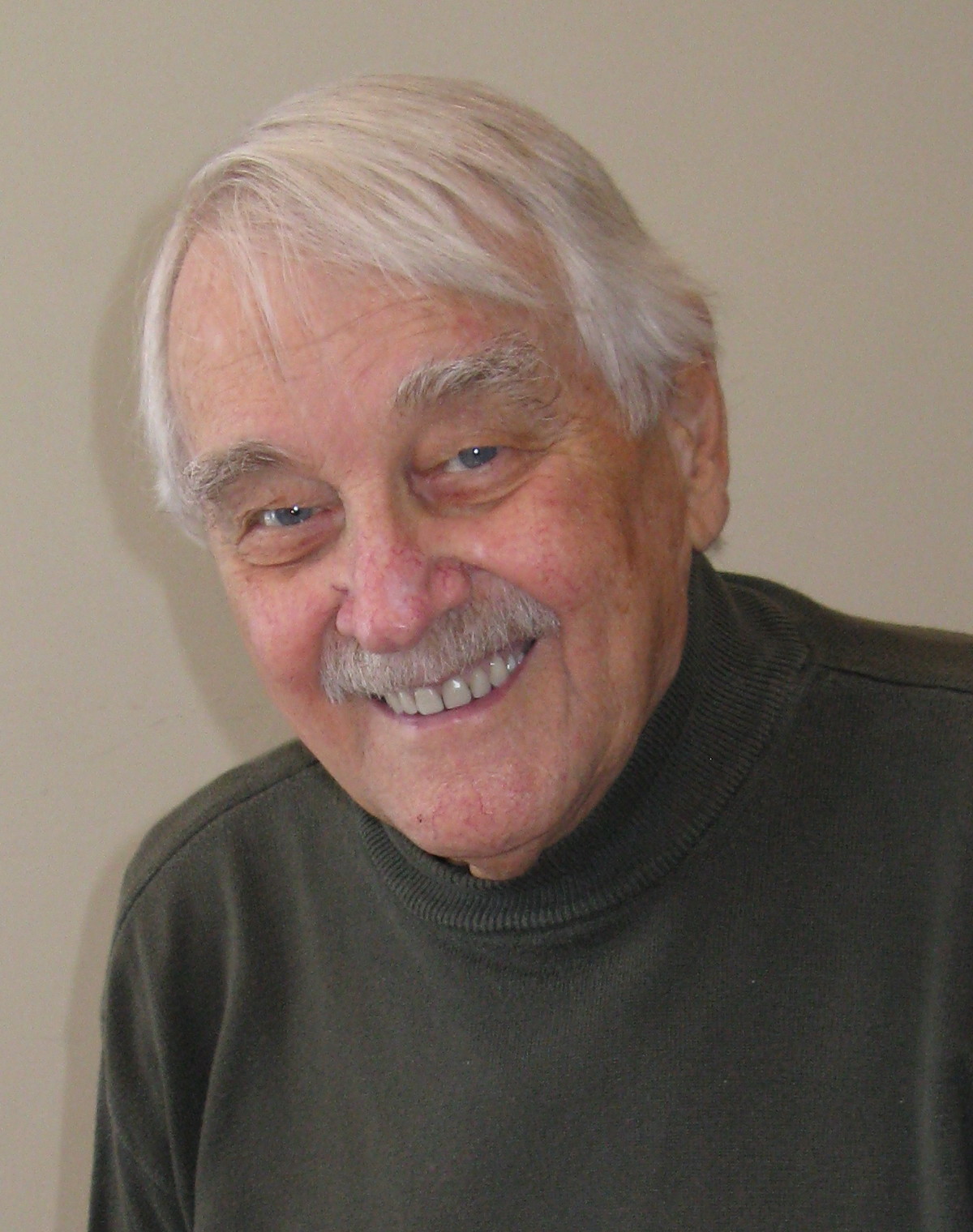 Claude A. POUPART